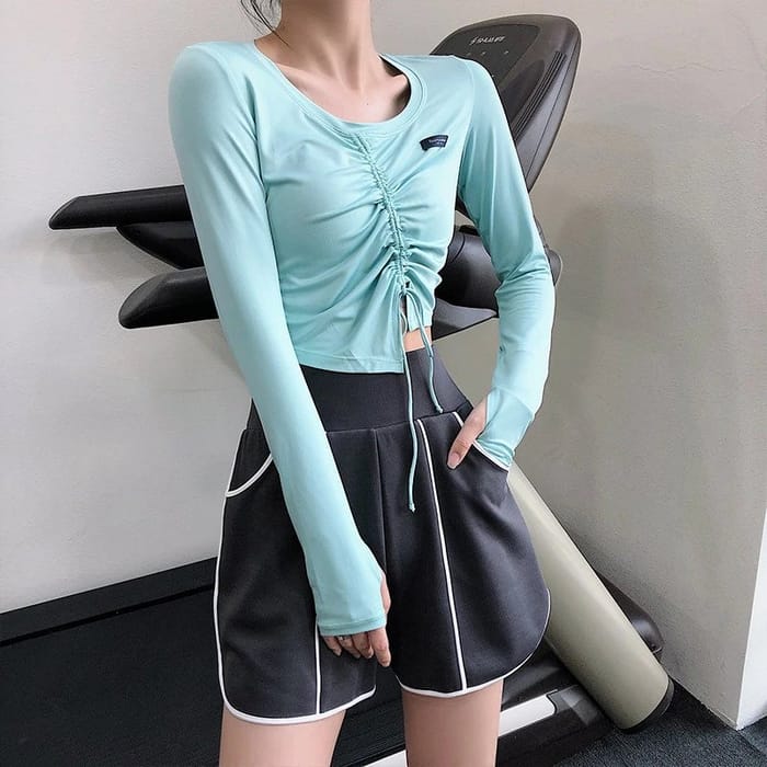 Black Long Sleeve Crop Top with Drawstring Detail and Purple Leggings Set
